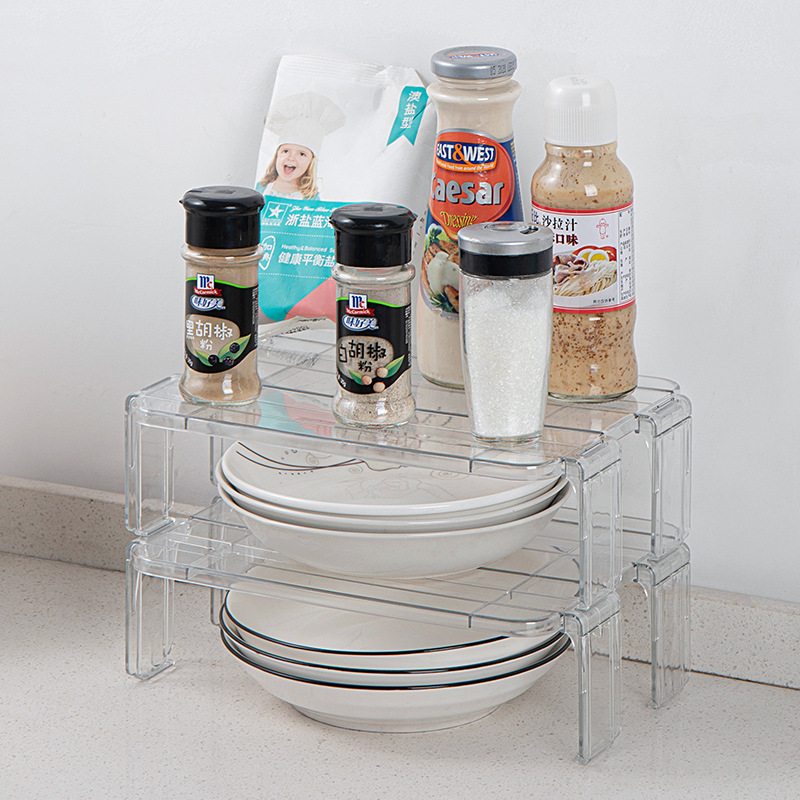 The interior of the refrigerator storage rack is equipped with multiple layers of kitchenware for household use. It features a tiered and partitioned noodle bowl rack and a seasoning bottle storage rack Application Scenario