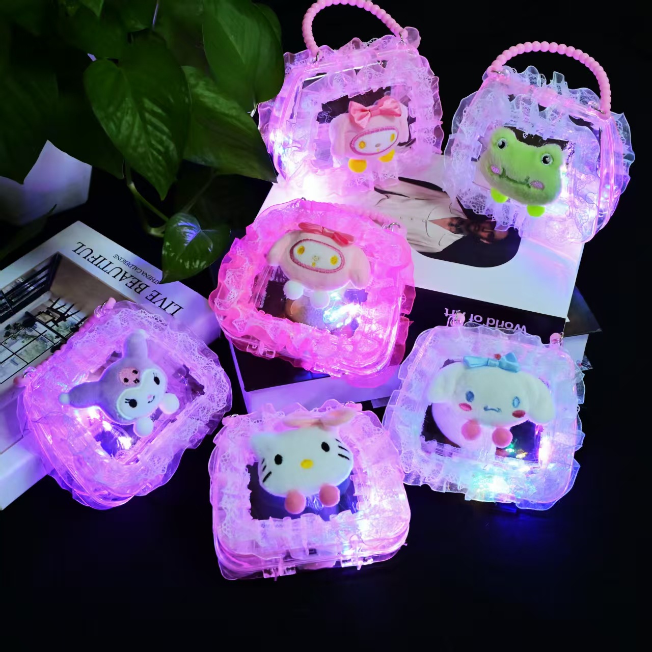 A popular cartoon illuminated handbag, a handmade diy bag, a finished children's toy, a girl's hand can be held diagonally across the bag