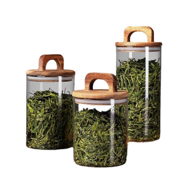 علب علب شاي مختومة زجاجية، وحاويات حبوب القهوة المختومة، مع عرض علب من الشاي المعلب Item Picture