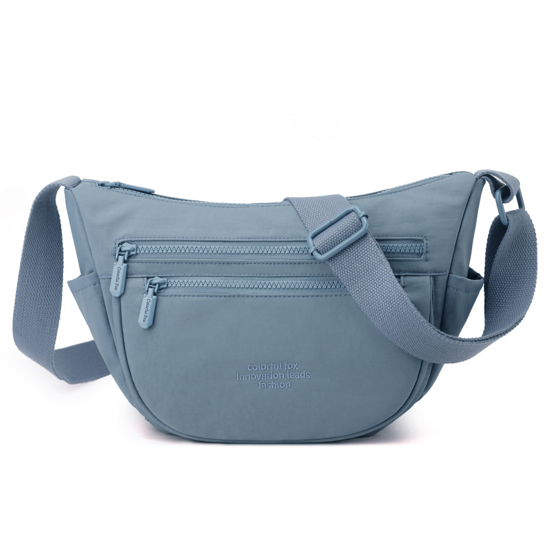 A new type of outdoor crossbody bag for men and women, featuring multi-pocket dumpling bags, water repellency and large capacity