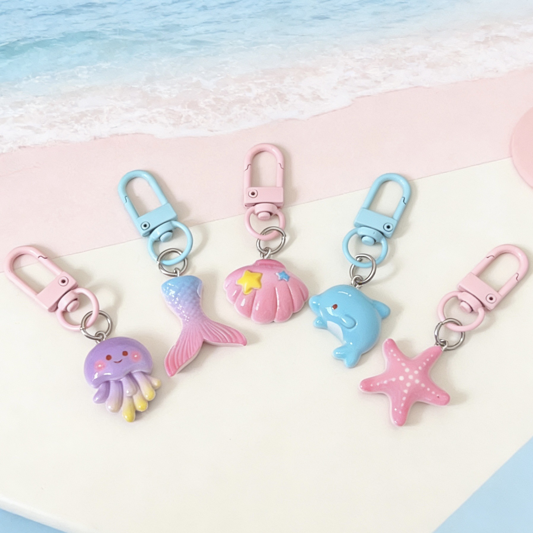 Pink and tender Marine animal keychains, cute cartoon dolphin shell pendants, ins soft and adorable starfish and jellyfish accessories