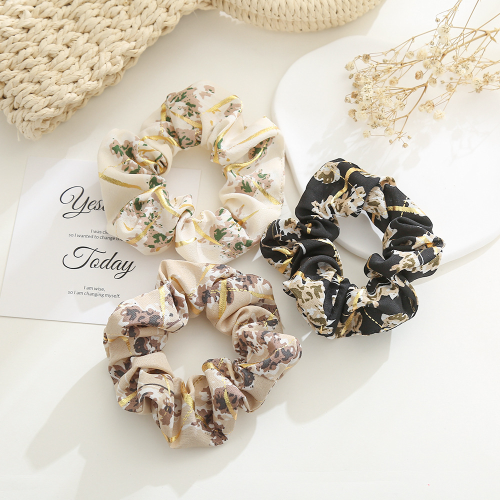 Pig intestine hair band, winter gold-embossed floral hair band, women's French high-end fabric hair tie headwear, wholesale for export