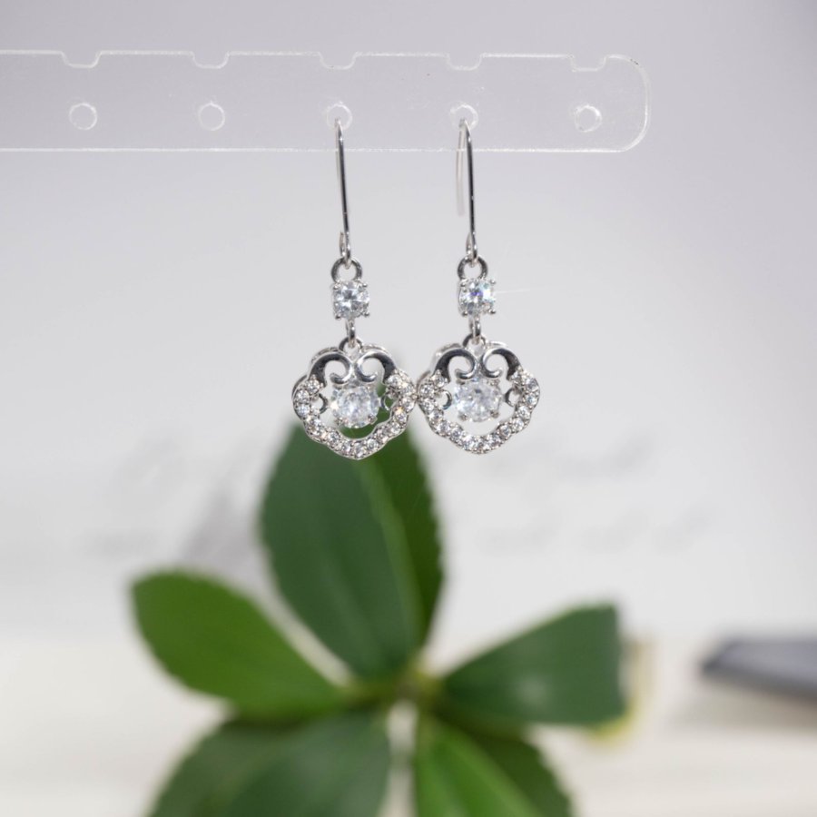 New copper-plated real gold fashionable women's Korean style simple and individual zircon earrings set with zircon safety lock ear hooks details Picture