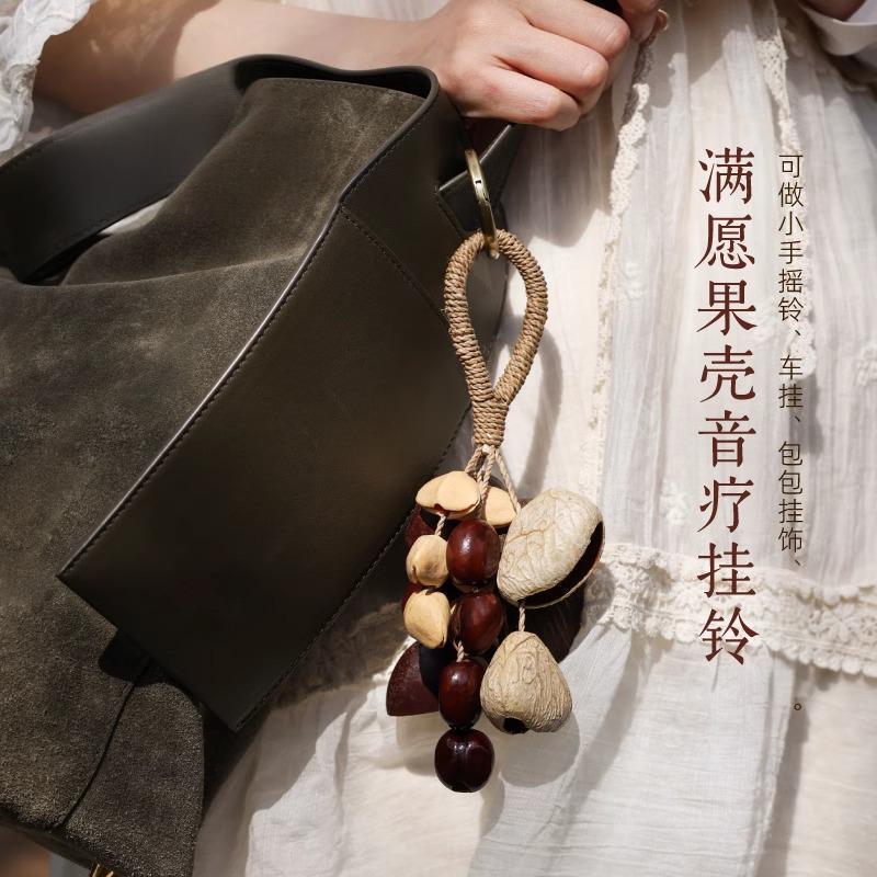 Duck tendon pendant, black fruit shell shoulder bag, full wish backpack, rattan bell pendant, fruit shell, Indonesian bell, fruit shell, sound therapy, oleander details Picture