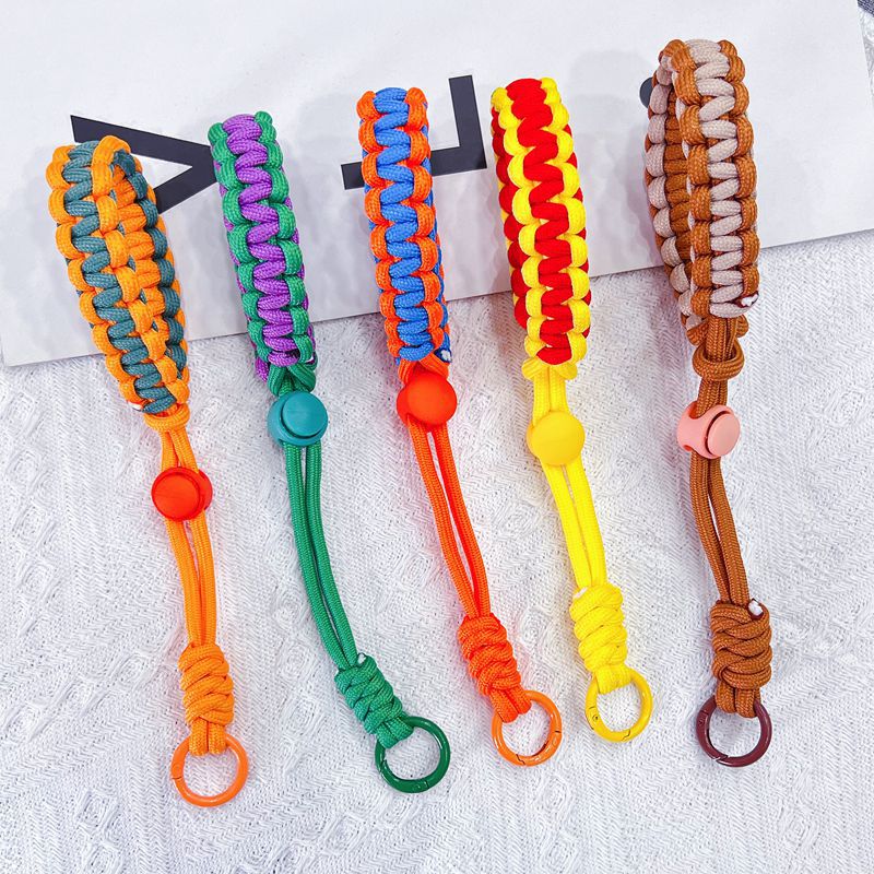 Hand-woven short mobile phone lanyard, adjustable multi-functional camera water cup wrist strap, anti-loss, sturdy and durable Application Scenario