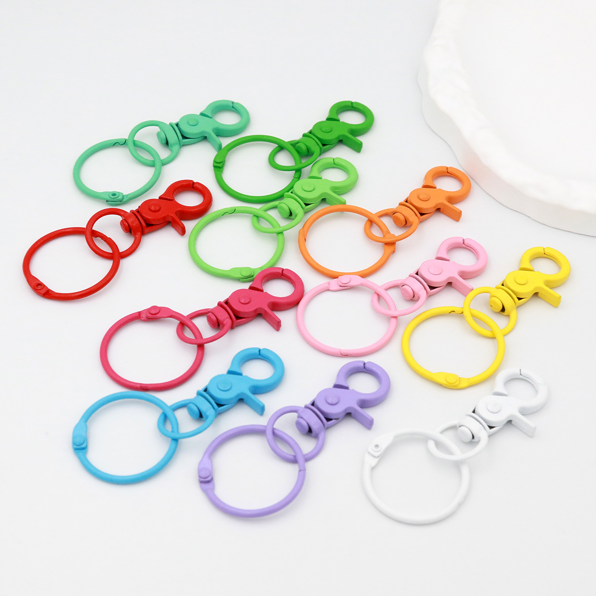 diy keychain accessories, colorful handcrafted keychain pendants, figurines, lacquered bag pendants
