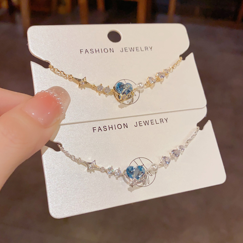 This exquisite, fashionable, light luxury and versatile star blue heart-shaped bracelet from Japan and South Korea features a simple and unique design