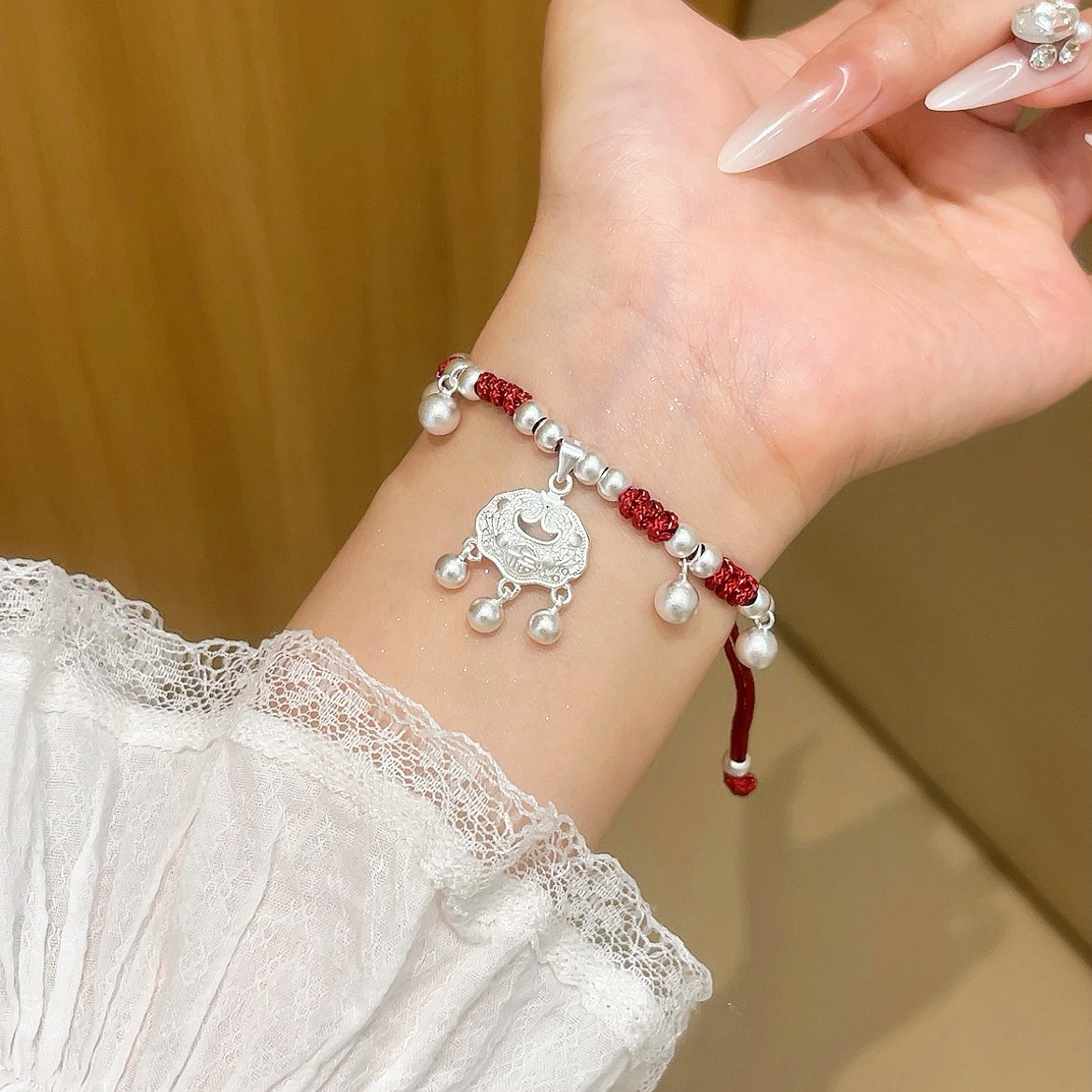 Copper-plated Miao silver lock bag bell hand-woven bracelet, pure handcrafted Chinese-style bracelet, bell red string bracelet full figure