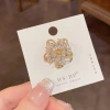 Wholesale of French light luxury, fashionable and high-end brooches slightly studded with zirconium petal buttons, which are unique, exquisite, versatile and super dazzling details Picture