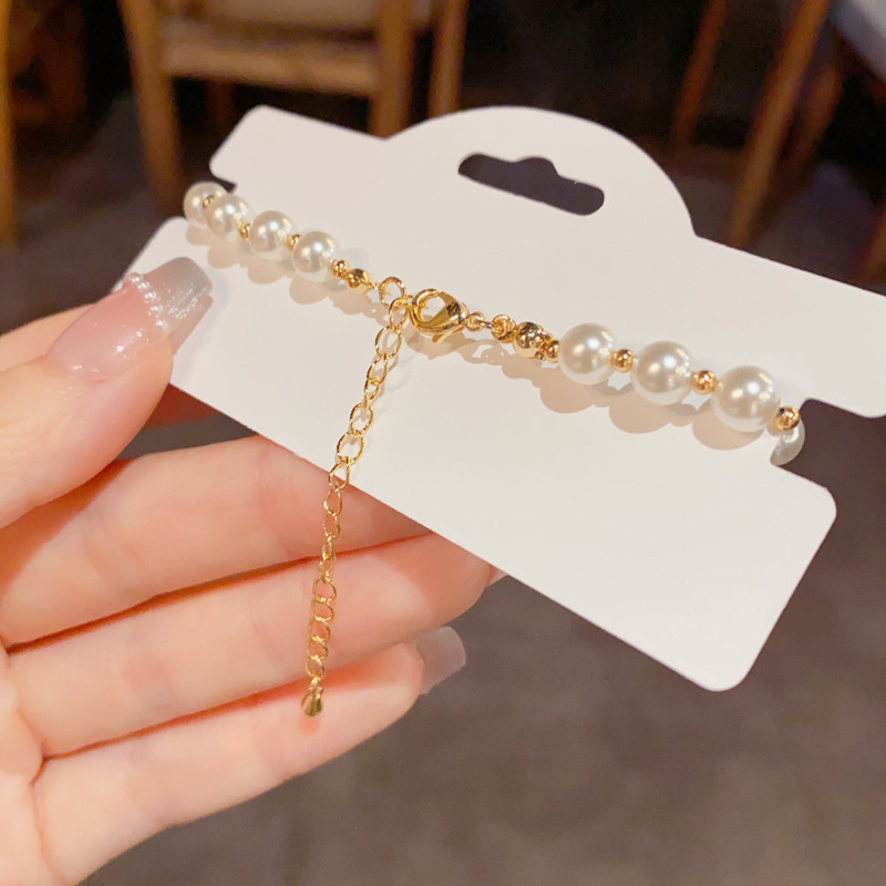 Nuevo China circonitas de cobre dinero perlas pulsera de perlas ligero lujo alto sentido de la cadena de mano temperamento versátil moda mano accesorios al por mayor Application Scenario