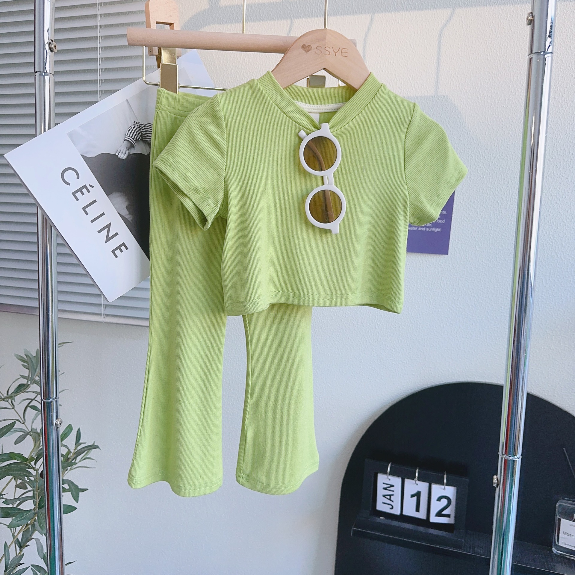 The 2026 Summer collection of popular children's clothing for girls is a Korean-style casual and soft short-sleeved T-shirt and top two-piece set for baby girls Application Scenario