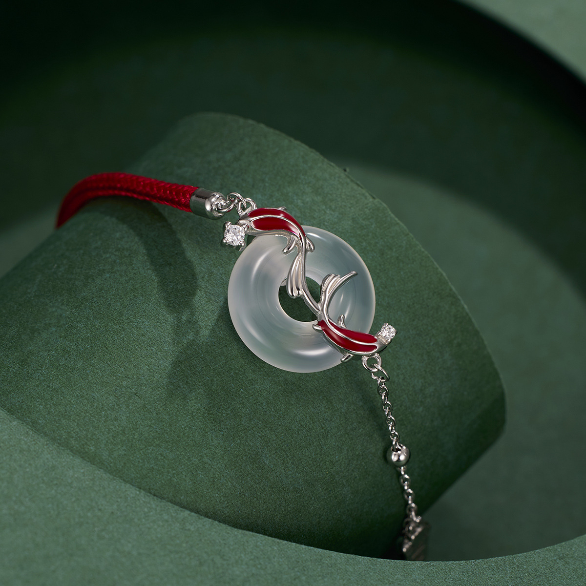The ashore koi peace pendant with a red string and natural chalcedony is a fashionable and versatile jewelry for the zodiac year Application Scenario