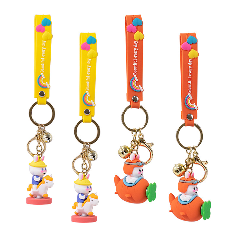Couple carousel Rabbit Year keychain, Little Rabbit flying bag pendant, creative silicone keychain manufacturer wholesale Item Picture