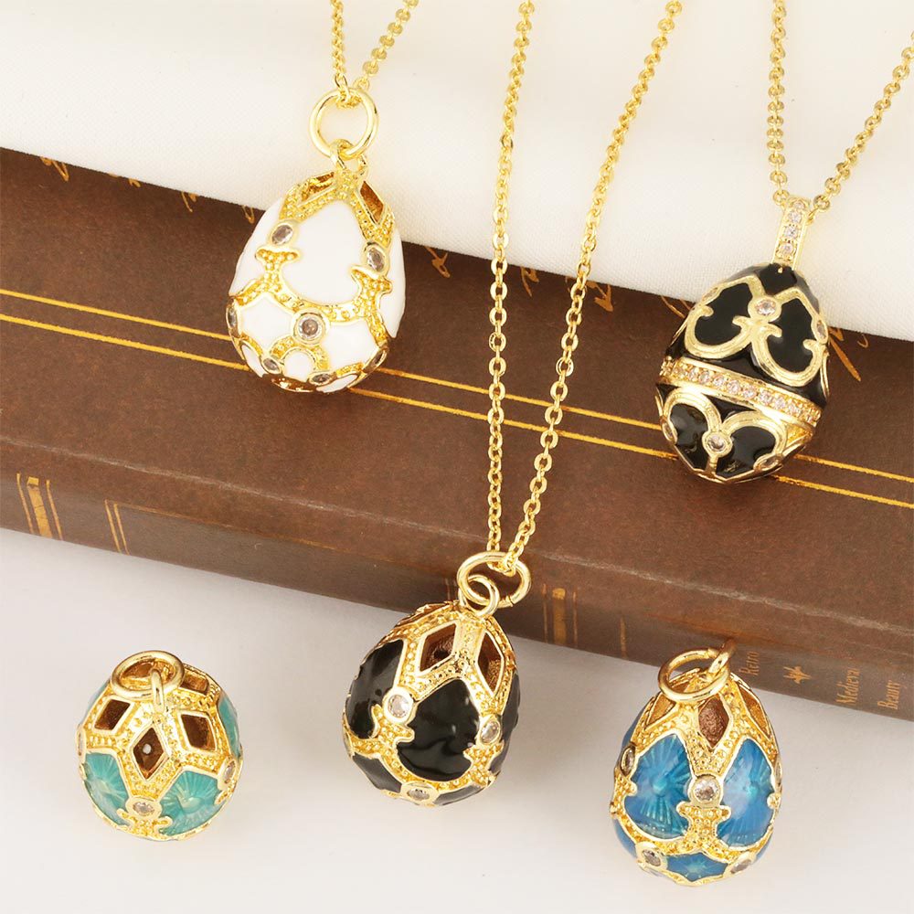 A cross-border lady's elegant and retro diamond-encrusted, water-drop hollowed-out Easter egg pendant necklace, copper-plated 18K gold jewelry