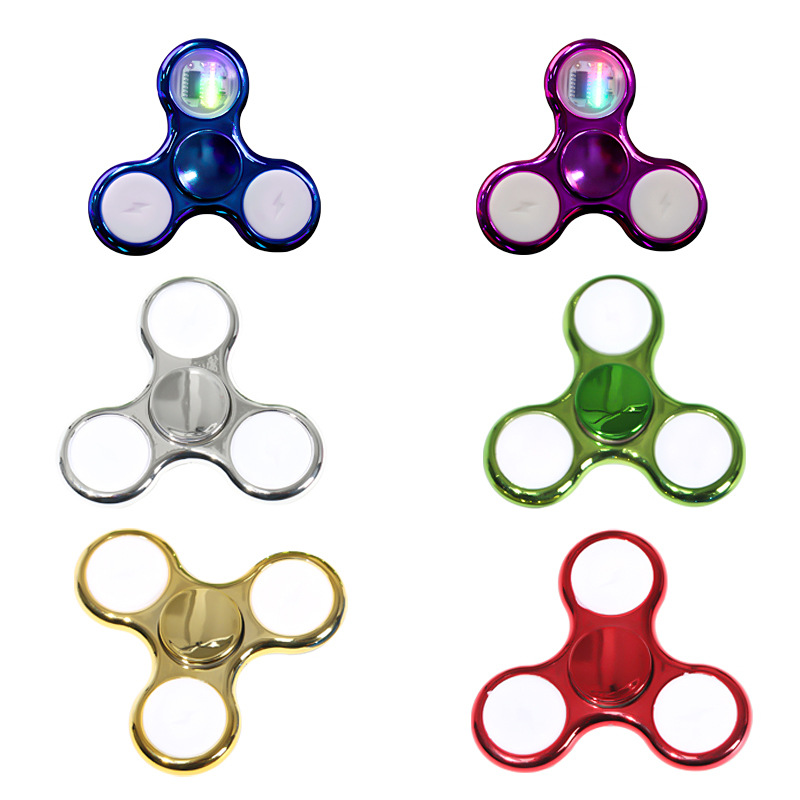 镀彩陀螺指尖带灯18变LED发光水晶儿童指尖陀螺玩具批发解压益智白底实物图