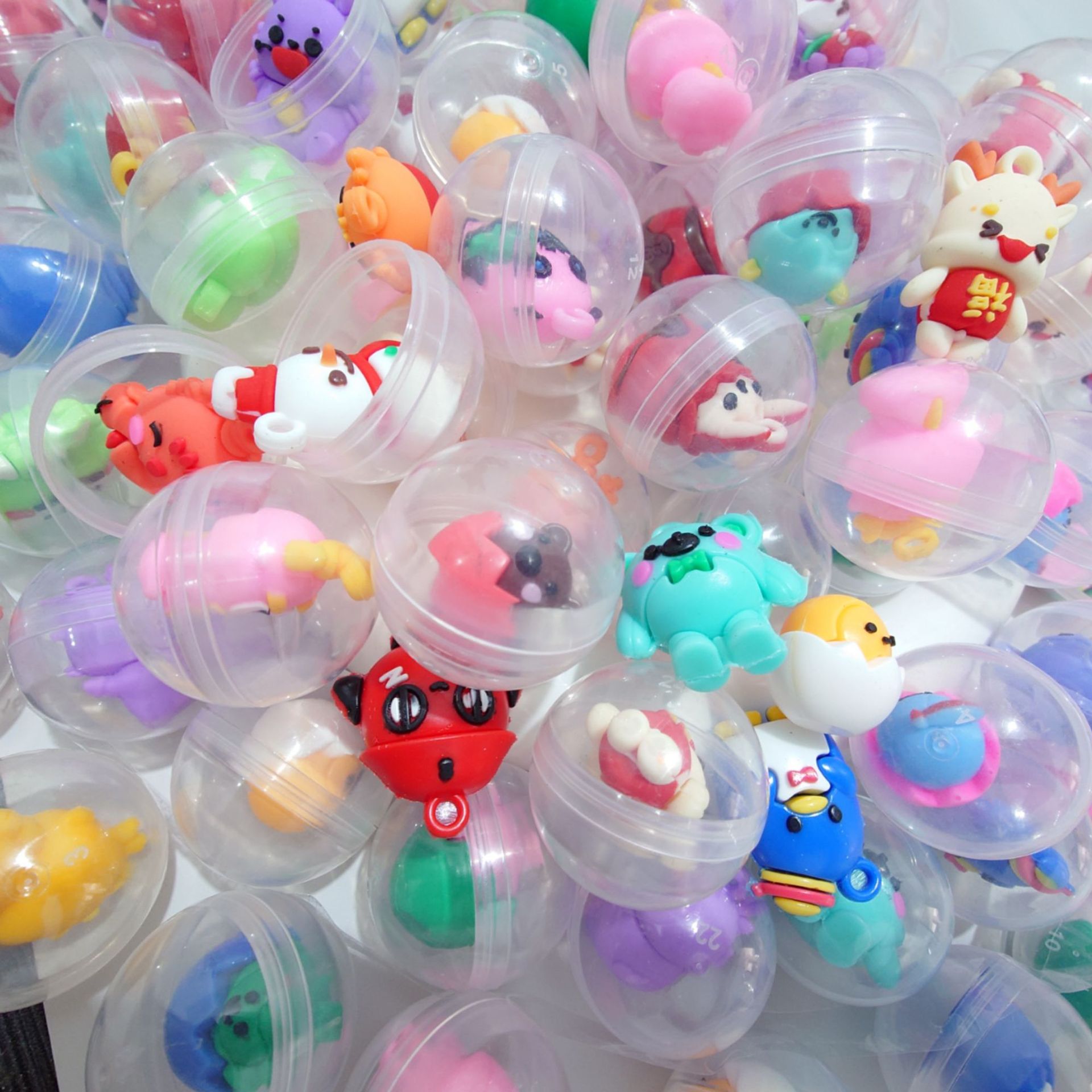 32mm透明公仔扭蛋玩具一元投币游戏扭蛋机弹力球扭扭蛋球批发细节图