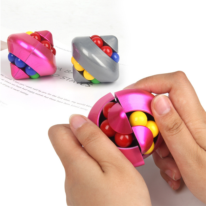 跨境解压旋转彩虹魔豆转珠TorshnPuzzle弹珠多功能飞碟魔方陀螺