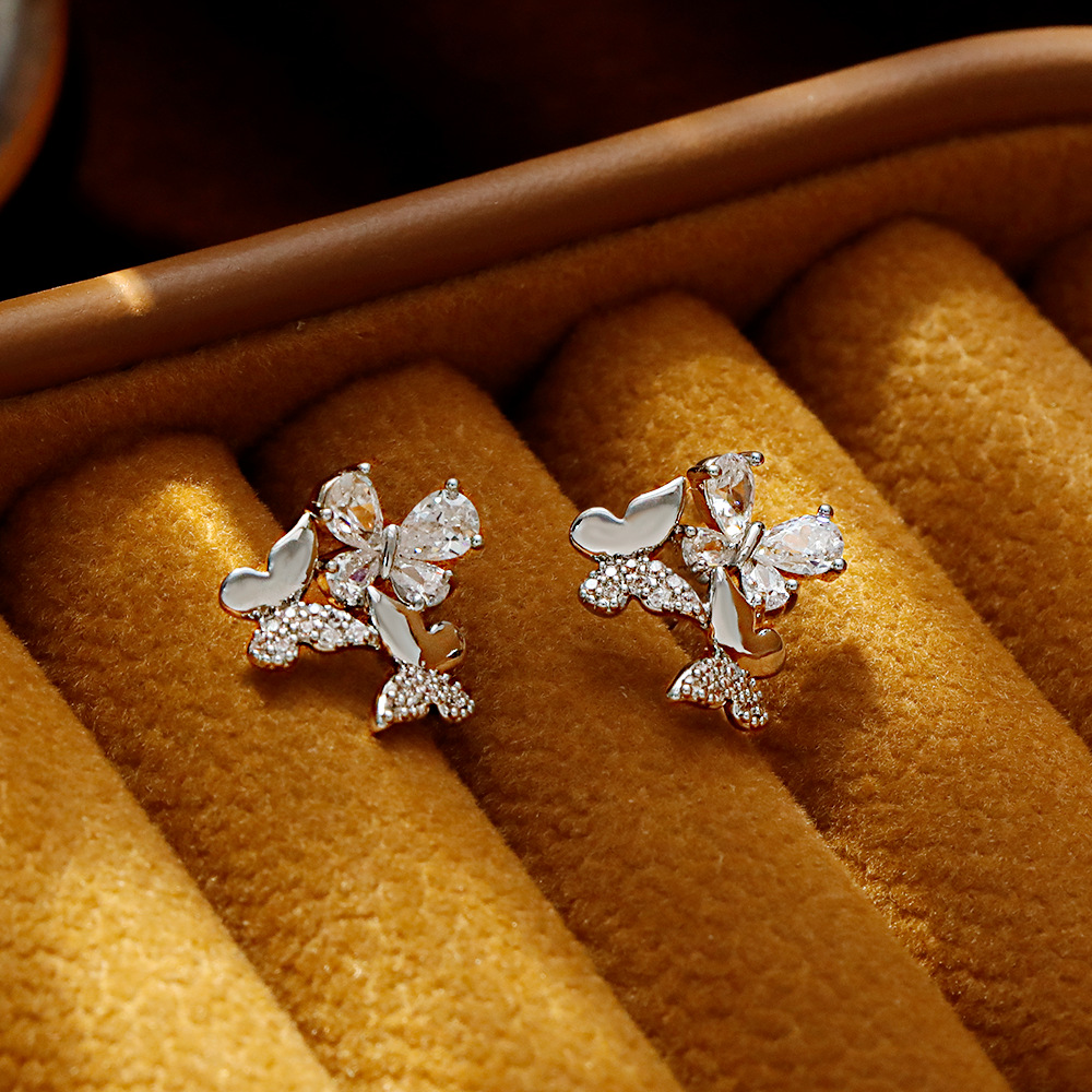 Hyacinth's niche design, the hollowed-out and sparkling zircon butterfly earrings, exude a sense of high-end women's elegance and a light luxury style. They are elegant and grand earrings and stunning stud earrings details Picture
