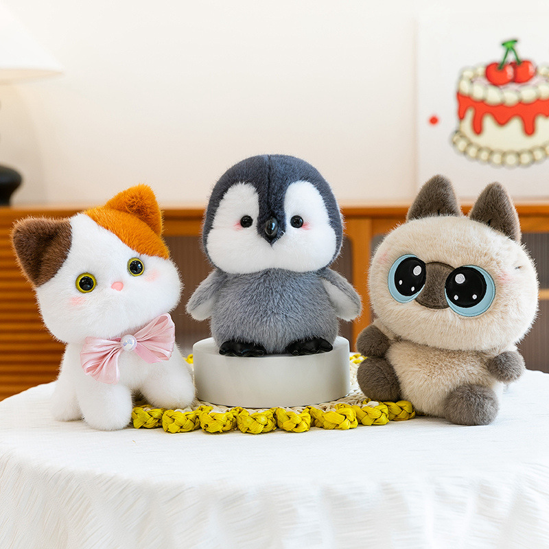 Scented table with small dolls, animal plush toys, toy dolls, computer decorative items, cats, rabbits and penguins details Picture