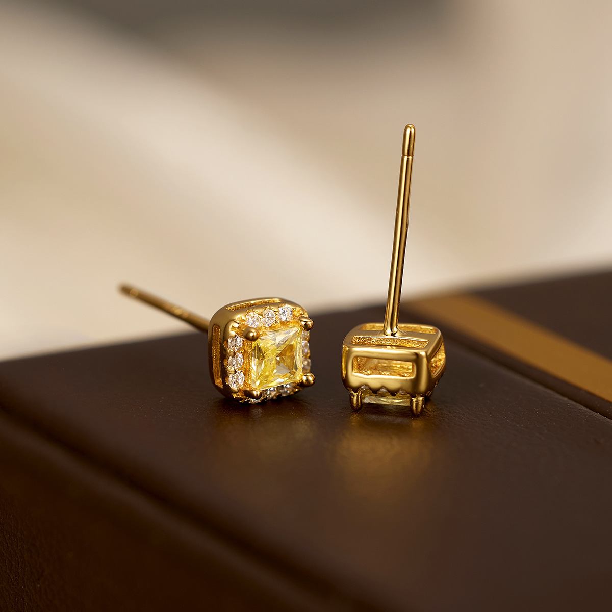 The new light luxury small square sugar stud earrings for women are fashionable and simple. The small square yellow diamond electroplated 18K silver earrings are selling well in Europe and America Application Scenario