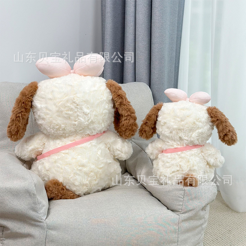蝴蝶结背包小狗毛绒玩具呆萌大耳狗狗公仔女生搂睡抱枕布娃娃批发产品图