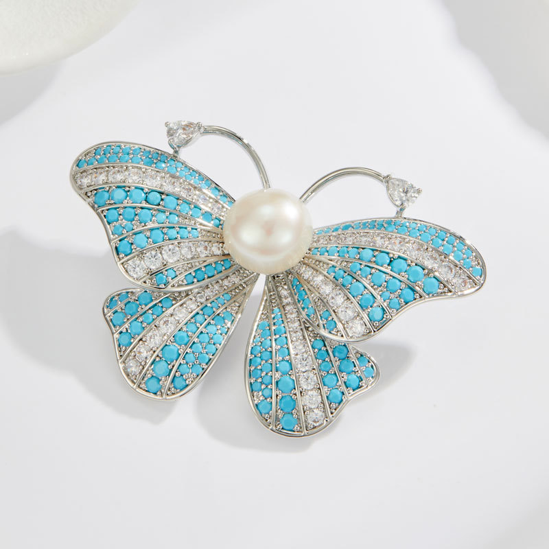 轻奢爆款双色满锆蝴蝶胸针铜合金微镶锆石淡水珍珠高级感优雅别针