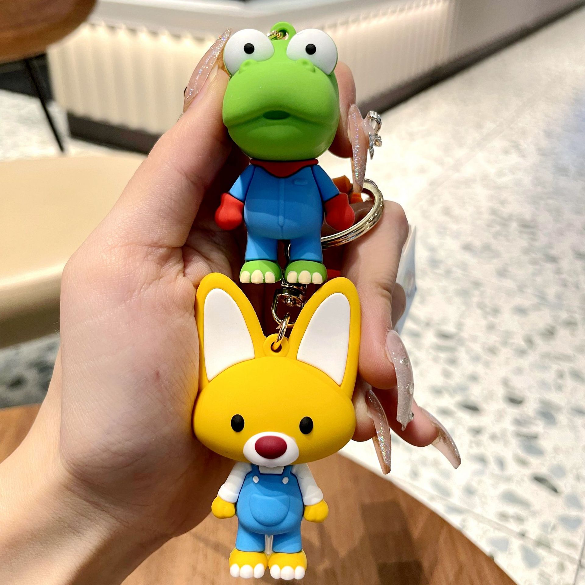 Wholesale of genuine creative Bolele cute cartoon dolls, keychains, couple schoolbags, small pendants, and popular online gifts Specification image