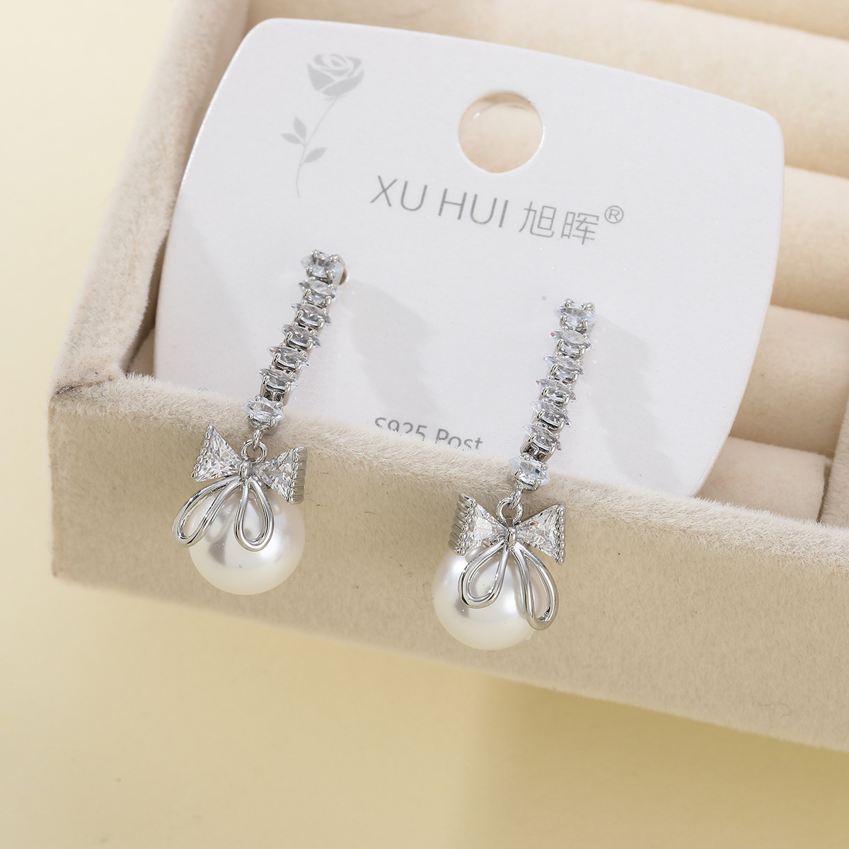 Gentle and lustrous pearl earrings, women's InS-style niche design sense S925 silver needle zircon bow earrings wholesale details Picture