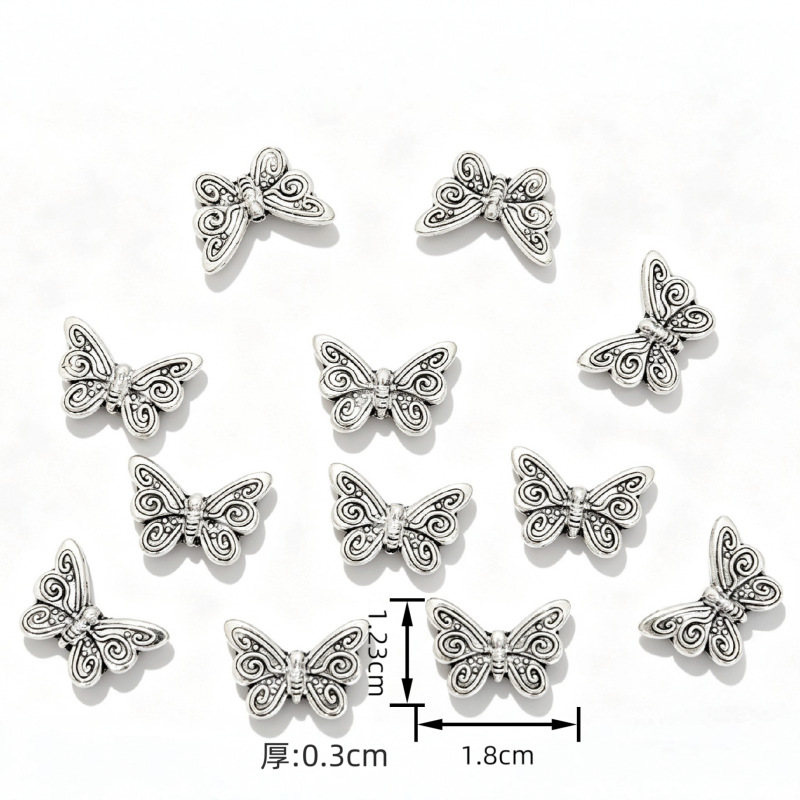 Vintage alloy butterfly beads ethnic DIY pulsera collar beads accesorios varios a través de agujeros butterfly beads details Picture