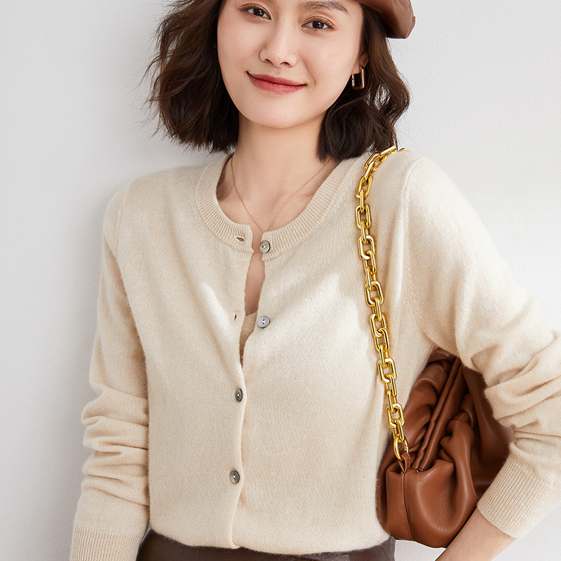 A new early spring style women's cardigan, long-sleeved knitted mini jacket, paired with a thin sweater, round-neck, loose, large-sized top details Picture