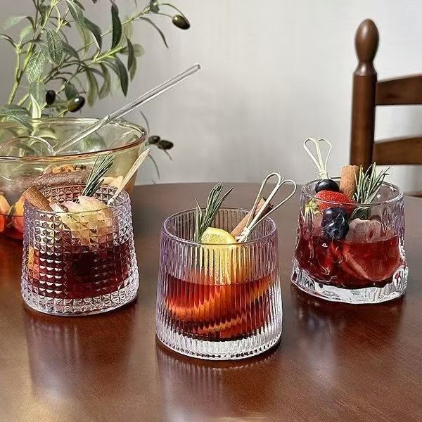 Wholesale creative whisky cups, household water cups, glass cups, foreign wine glasses, hammer-patterned cups, large-mouthed bars