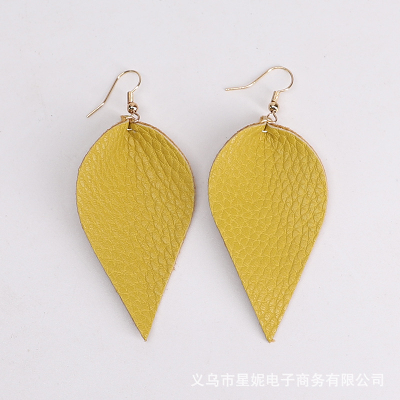 Fine-grained pu leather leaf style earrings, popular in Europe and America. Simple and exquisite pu leather leaf earrings, cross-border e-commerce supply Specification image