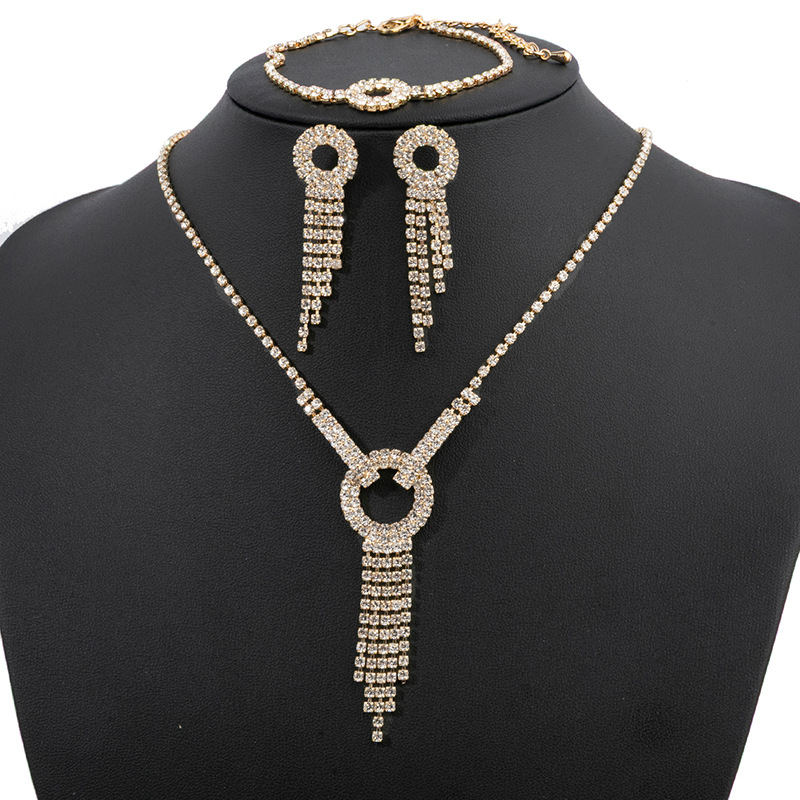 Wholesale supply of cross-border chain, rhinestone, tassel, necklace, earrings, bracelet, luxury three-piece set, banquet dress and wedding accessories details Picture