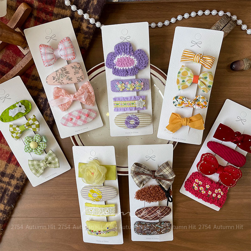 Nueva versión coreana floral paño horquilla hecha a mano para niños dulce lateral pelo roto pinza flequilla multicolor adorno para el pelo dulce Pom.kr dulce hermana vintage horquilla: arco plagado floral otoño invierno variedad versátil menos details Picture