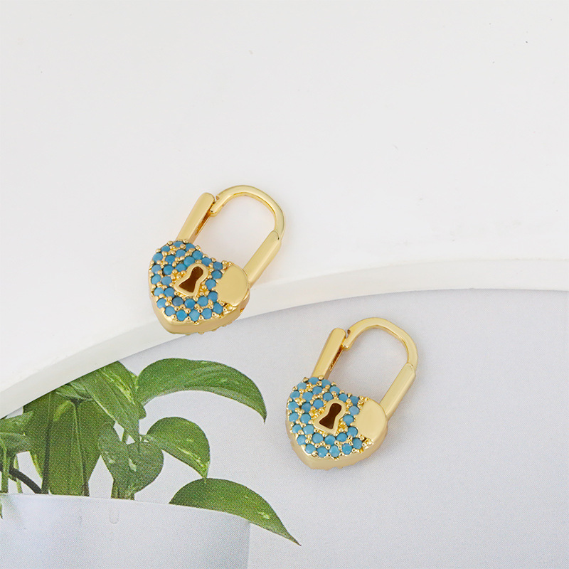 Cross-border source fashion European and American cold style heart-shaped lock earrings, women's brass plated with real gold and slightly inlaid zircon color preservation earrings Application Scenario