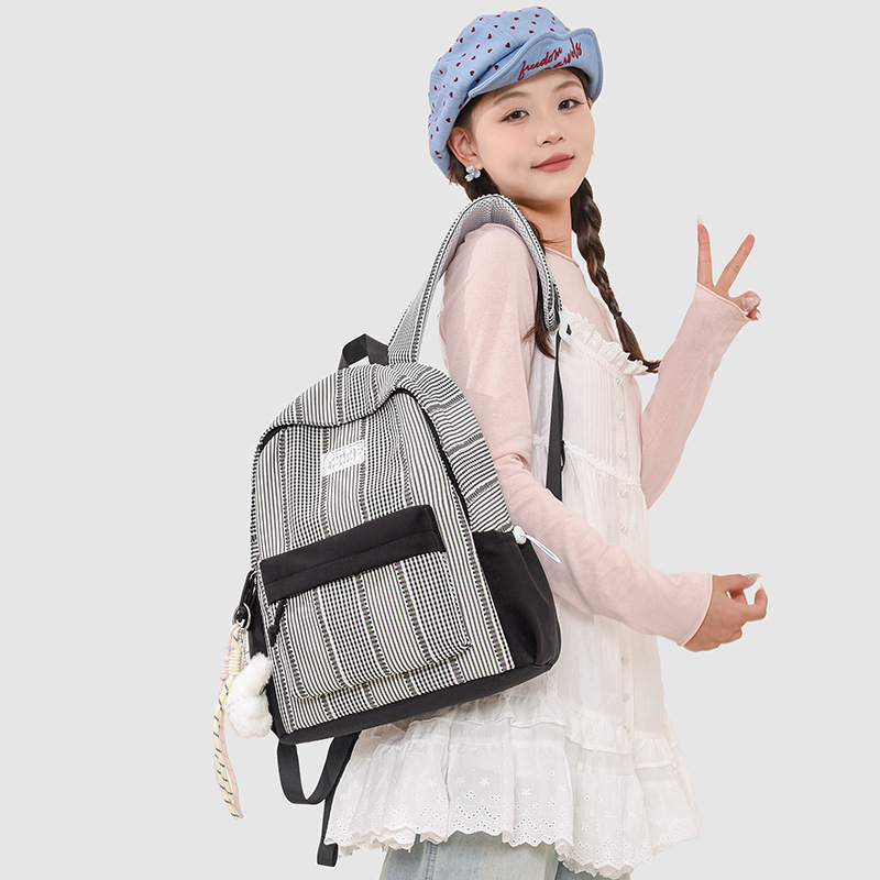 The 2026 new Japanese-style girlish checkered backpack is lightweight and has a large capacity. It is a versatile and cute student backpack Application Scenario