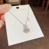 This Japanese and Korean fashion, light luxury, slightly inlaid zircon flower planet necklace is a unique and stylish design with a versatile collarbone chain accessory Application Scenario
