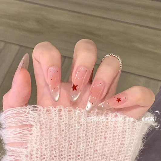Wholesale of 10-piece handcrafted wearable nail stickers with a sweet, cool and fair look, featuring star-shaped cat's eyes