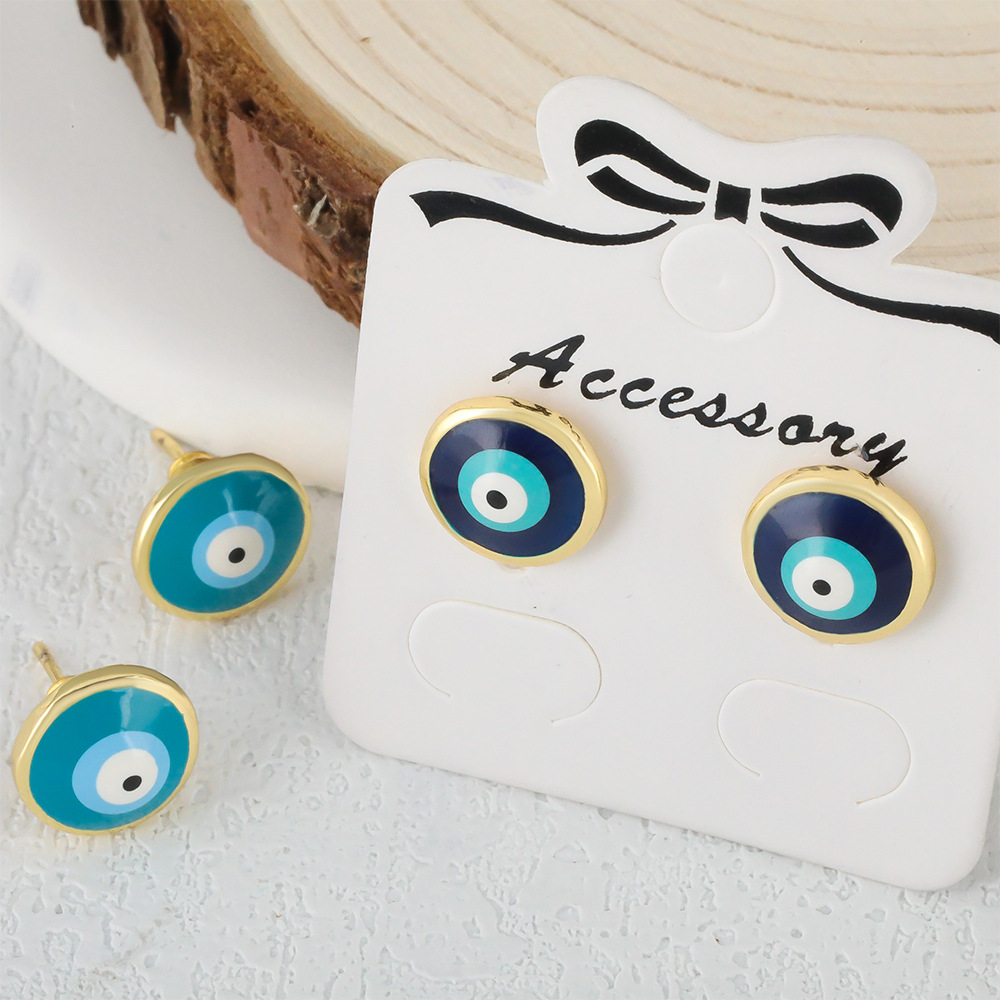 Honglu Cross-border Fashion copper-plated real gold personalized design eye earrings Simple style Oil Drip Devil Eye Stud earrings for women Application Scenario