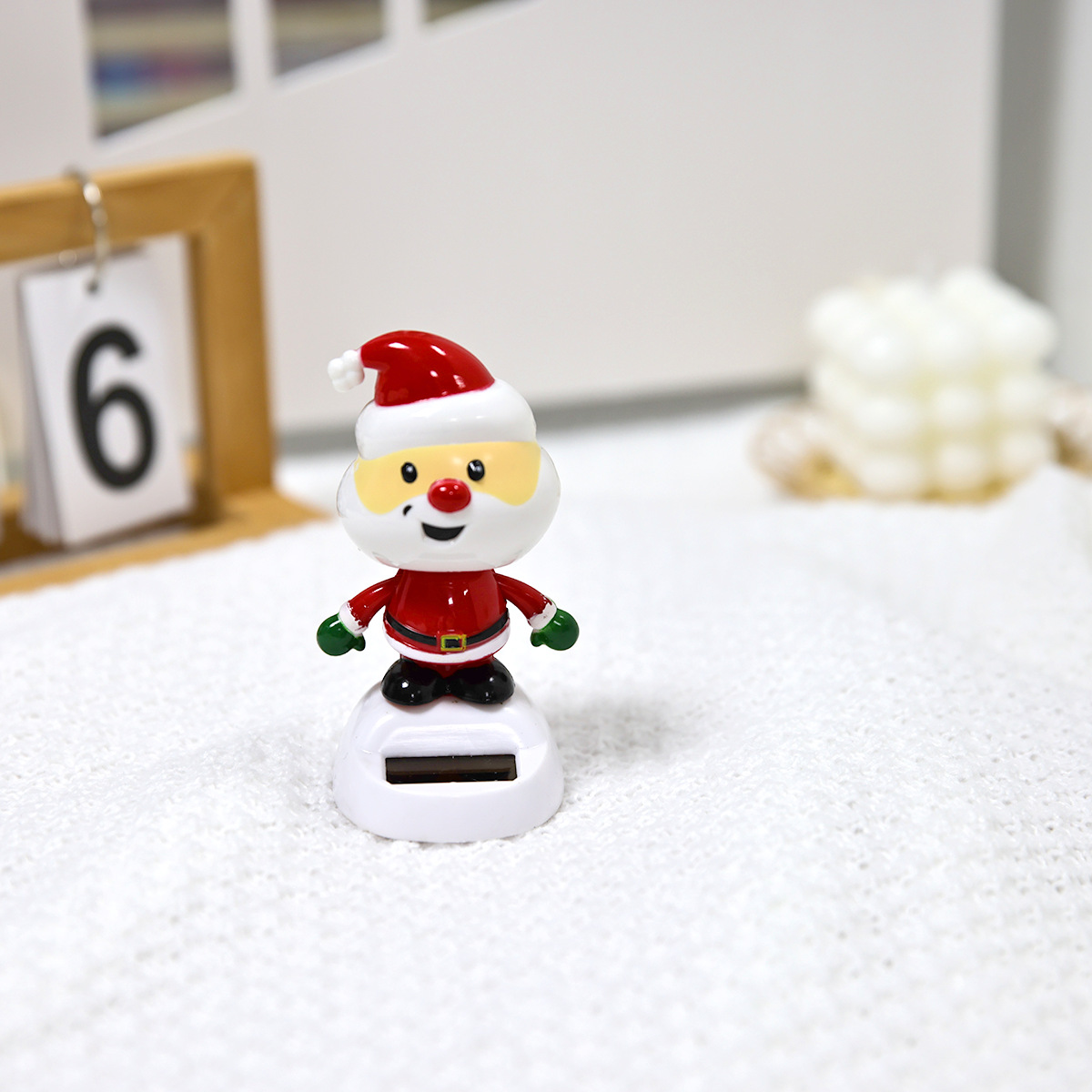 Factory direct sales of solar car interior ornaments, Christmas festival gifts, and cute Santa Claus decorations available for wholesale