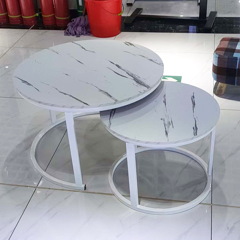 A light luxury minimalist coffee table with a round table for small-sized apartments. A creative rock plate round coffee table set for the living room Specification image