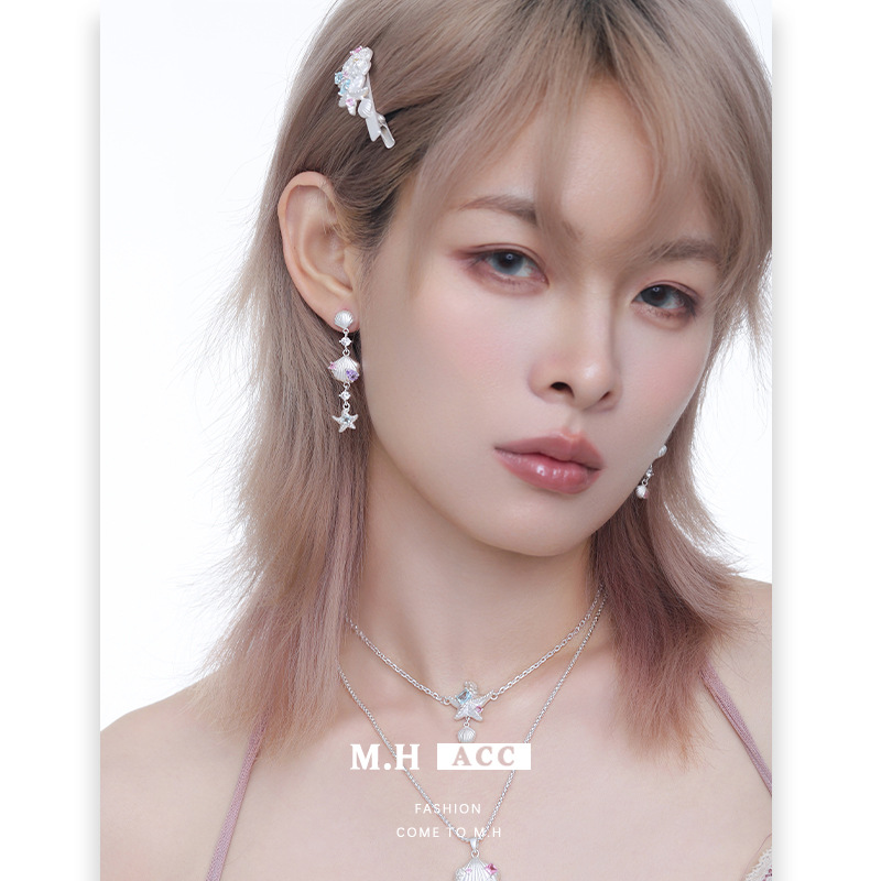 Asymmetrical tidal star shell long earrings, a light luxury, niche, sweet, cool, fashionable, versatile and high-end fringed ear accessory for women Specification image