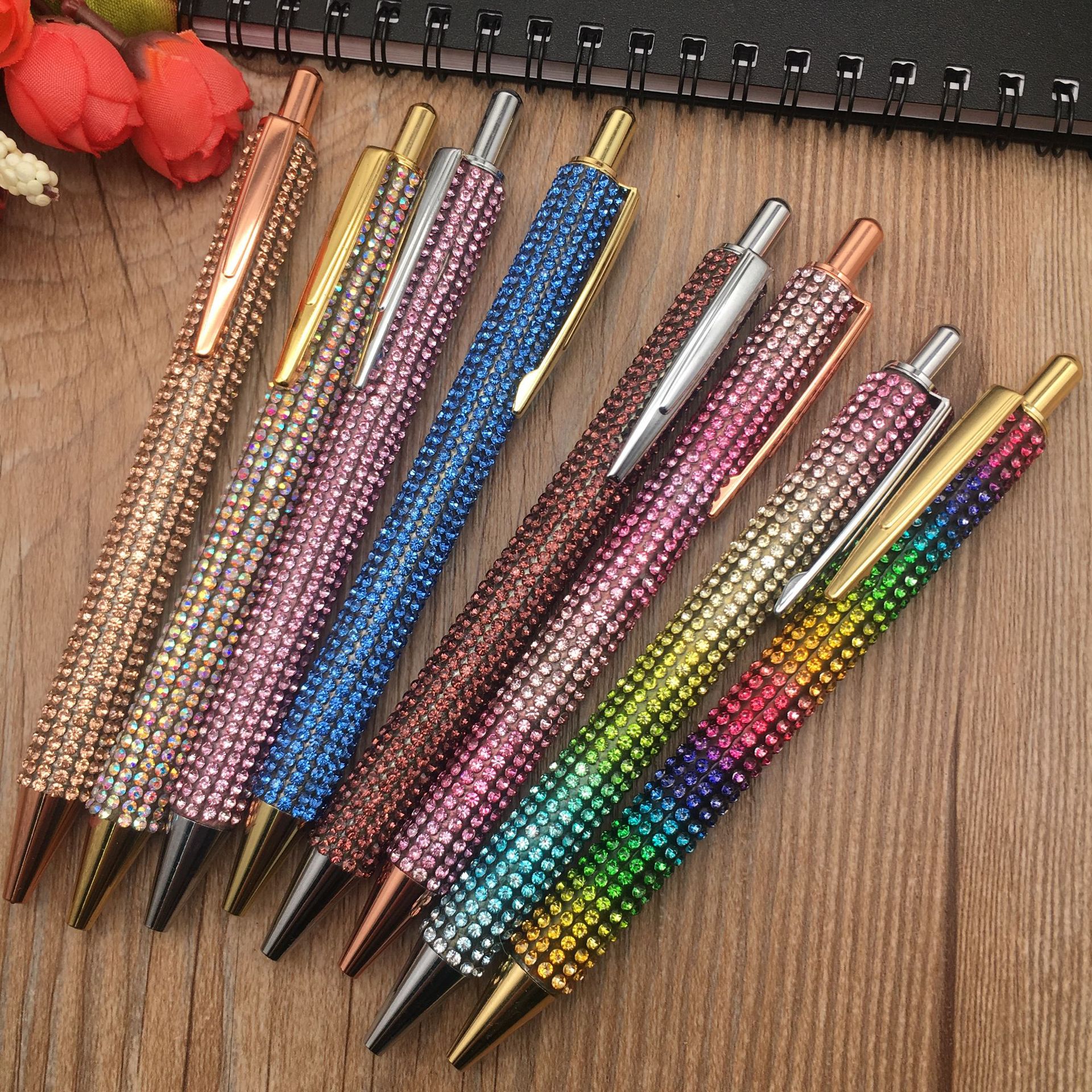 Metal core press diamond pens, ballpoint pens, multi-color copper metal pens, crystal pens, water diamond pens are in stock and available for wholesale details Picture