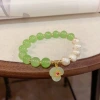 Spring new style, stylish and elegant, new Chinese-style freshwater pearl lotus beaded bracelet, light luxury and versatile, fresh and delicate jewelry details Picture