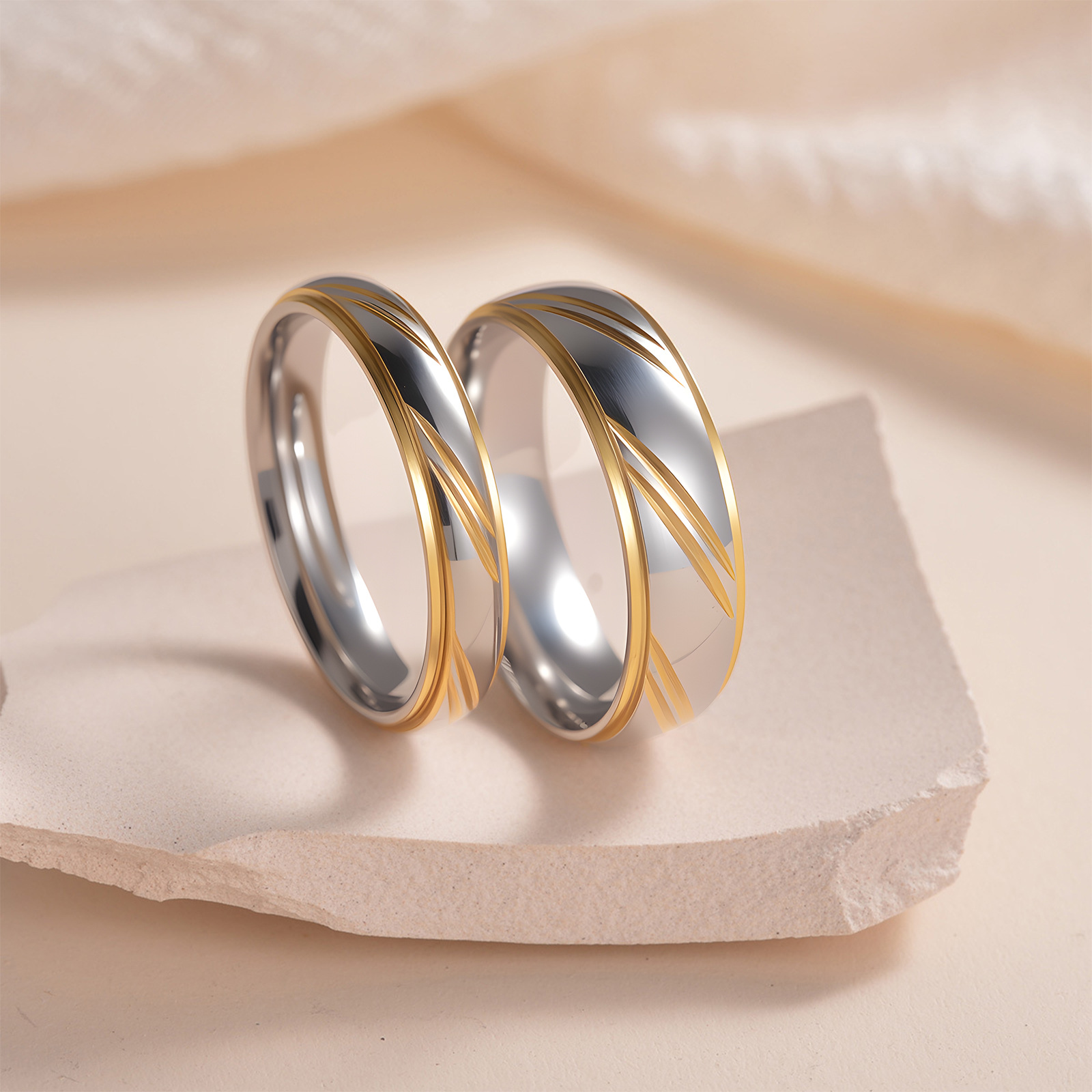 Cross-border stainless steel couple rings, golden diagonal diamond-encrusted rings, European and American fashionable wedding rings for men and women details Picture