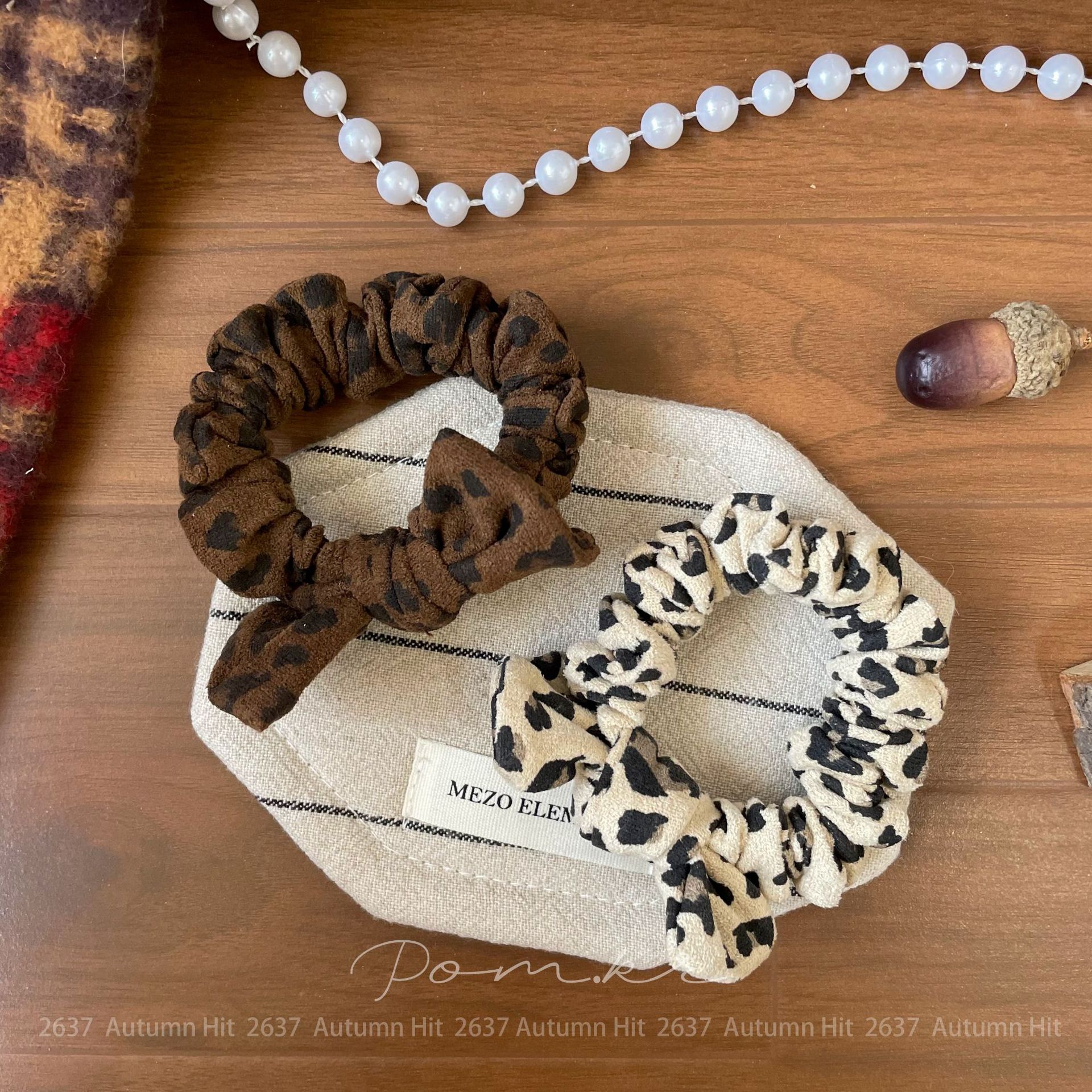 A new style of Korean-style retro leopard print small intestine hair band with a high-end, fashionable and stylish ponytail leather band hair accessory details Picture