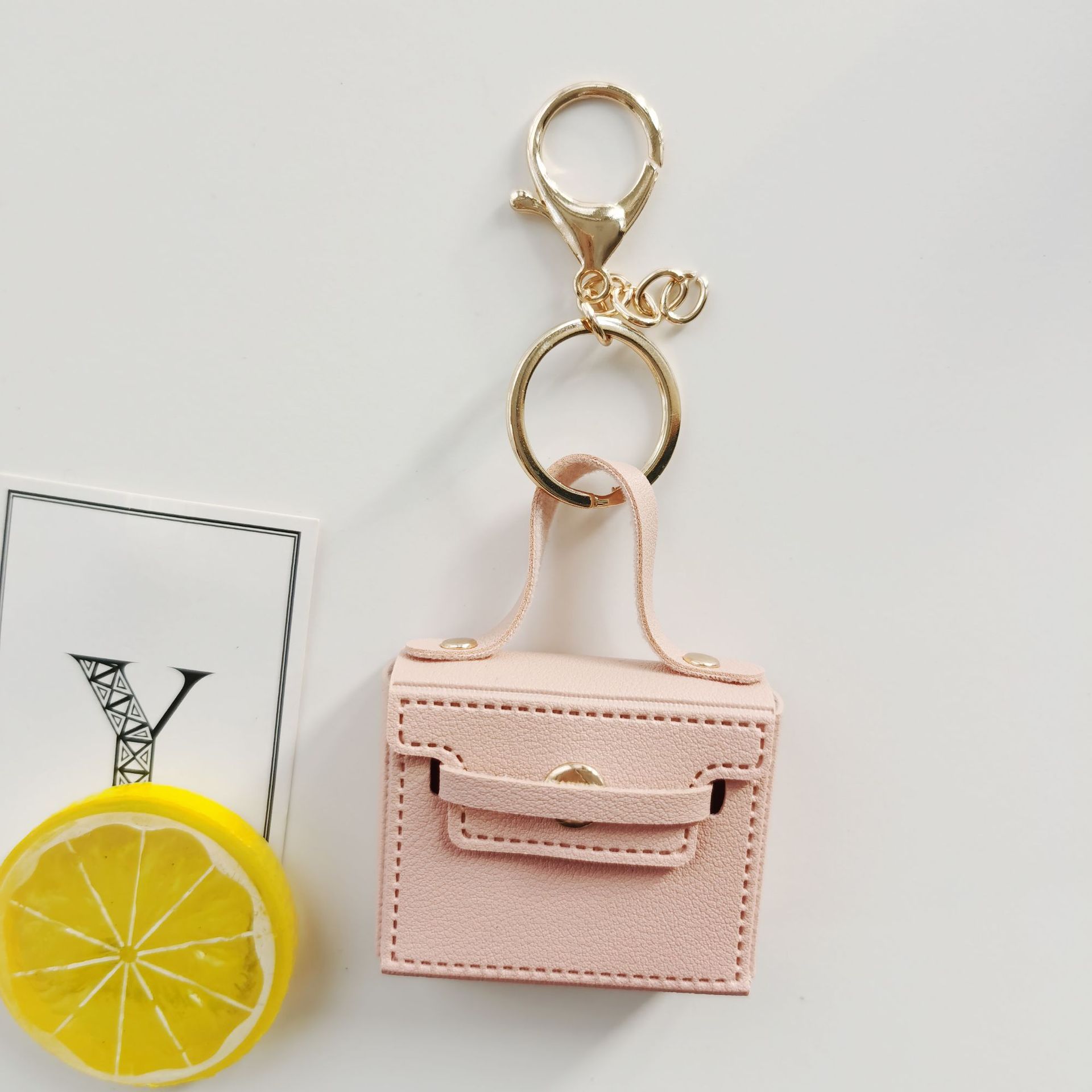 Creative bags, keychains, gifts, cross-border leather mini coin purses, ornaments, car key pendants, accessories and ornaments Application Scenario