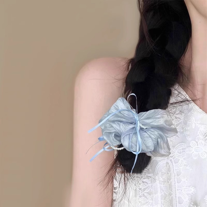 Elegant mesh bow hair tie for women, versatile and stylish bun hair accessory, sweet and high-end hair flower Application Scenario