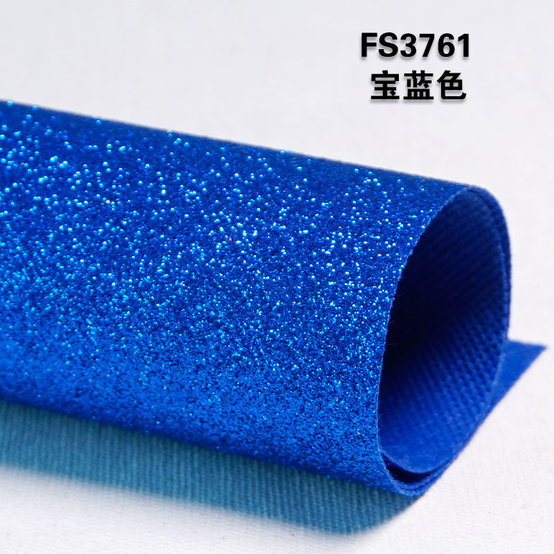 The bottom surface is made of the same color of golden onion glitter non-woven fabric for Christmas festival decoration, stage background, table flag, and glitter fabric