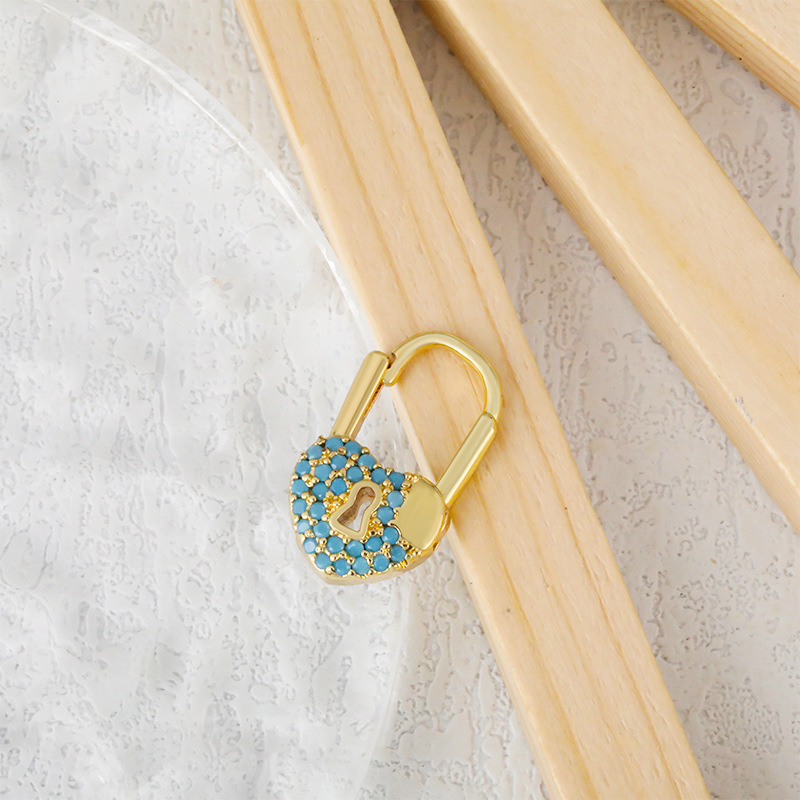 Cross-border source fashion European and American cold style heart-shaped lock earrings, women's brass plated with real gold and slightly inlaid zircon color preservation earrings details Picture
